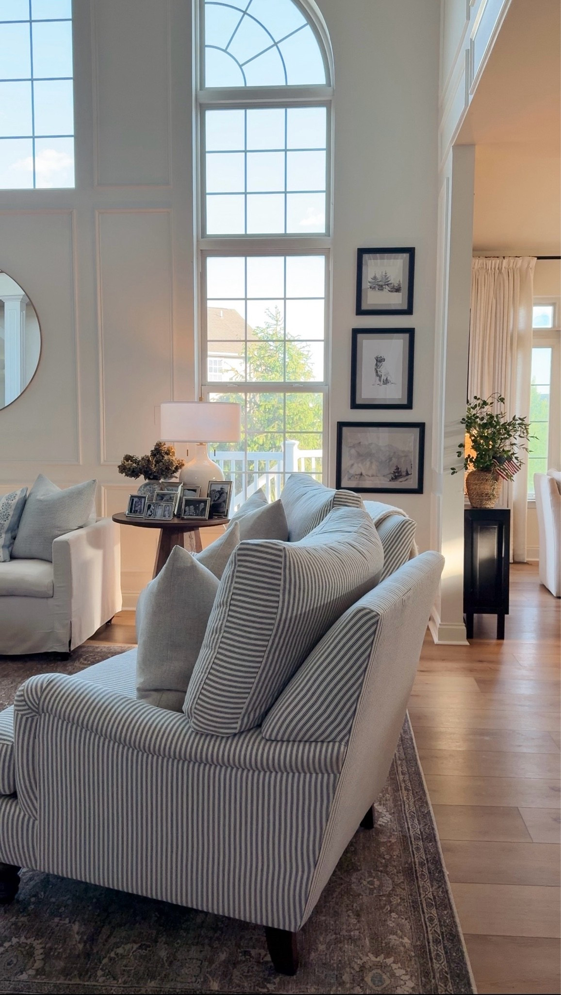 Summer living room decor. Pinstripe upholstered accent chairs. Wayfair furniture. English armroll chair.

#LTKSeasonal #LTKHome #LTKSaleAlert