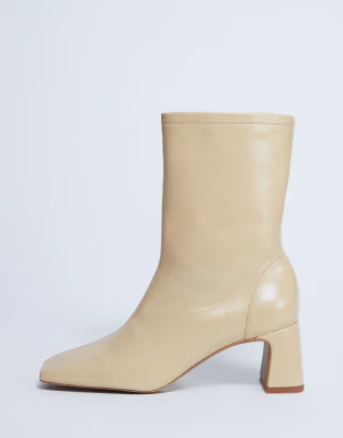 Sara Premium leather square toe flared heel boot in buttermilk | Topshop