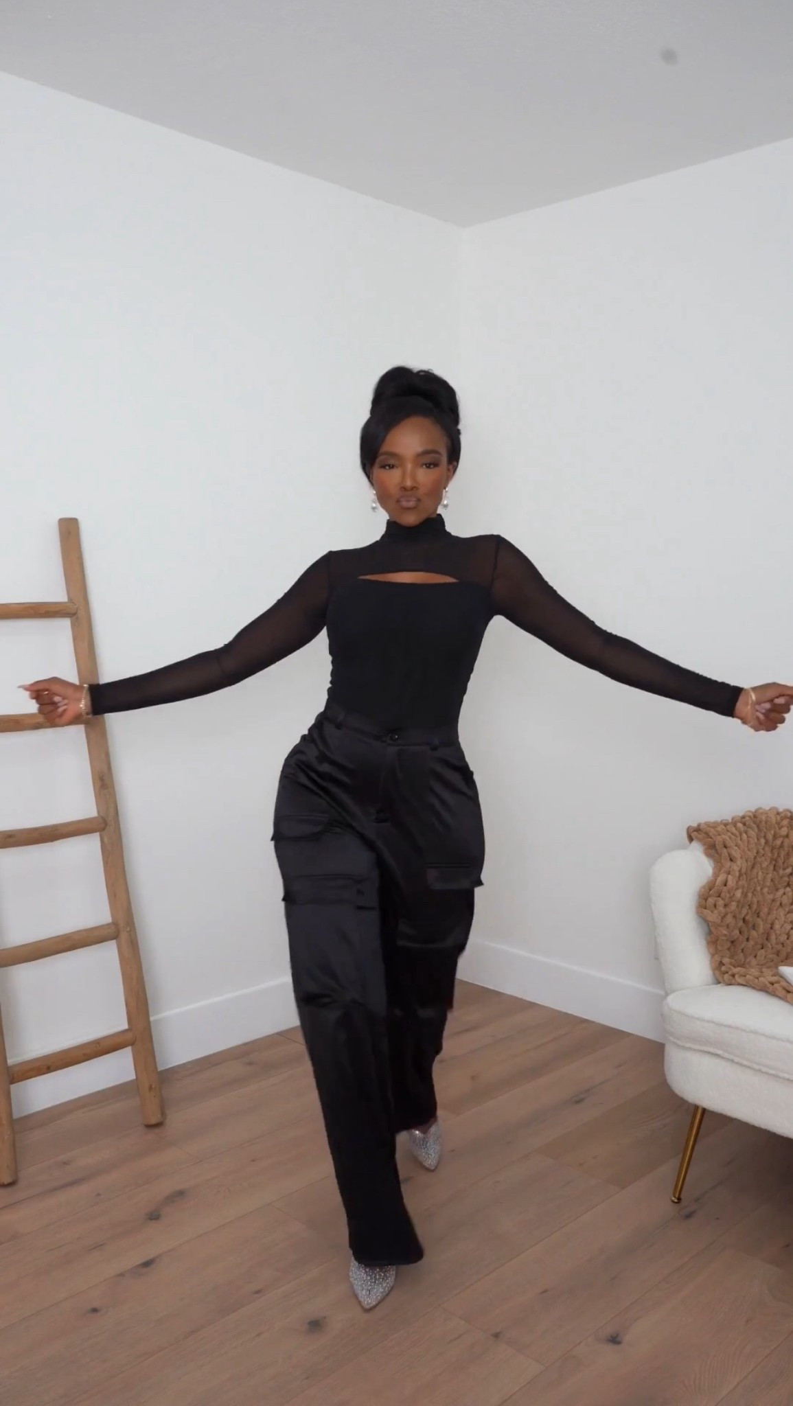 A sleek, modern all-black moment — this sheer long-sleeve top paired with structured cargo trousers is giving confident, elevated energy. The mix of soft mesh and tailored utility details keeps it bold without trying too hard.

Finished with pointed heels for that sharp, fashion-forward edge.

Perfect for holiday parties, nights out, and elevated dinner plans.

black cargo pant outfit, sheer top styling, modern all-black look, chic night out outfit, elevated monochrome fashion

📏 Measurements: 5’4” · 138 lbs · 34D · 27” waist · 40” hips
📏 Sizing: Small (top & pants)

✨ Everything linked below for easy shopping

Follow me on Instagram and YouTube @kirasfashionfinds

#LTKPetite #LTKHoliday #LTKootd