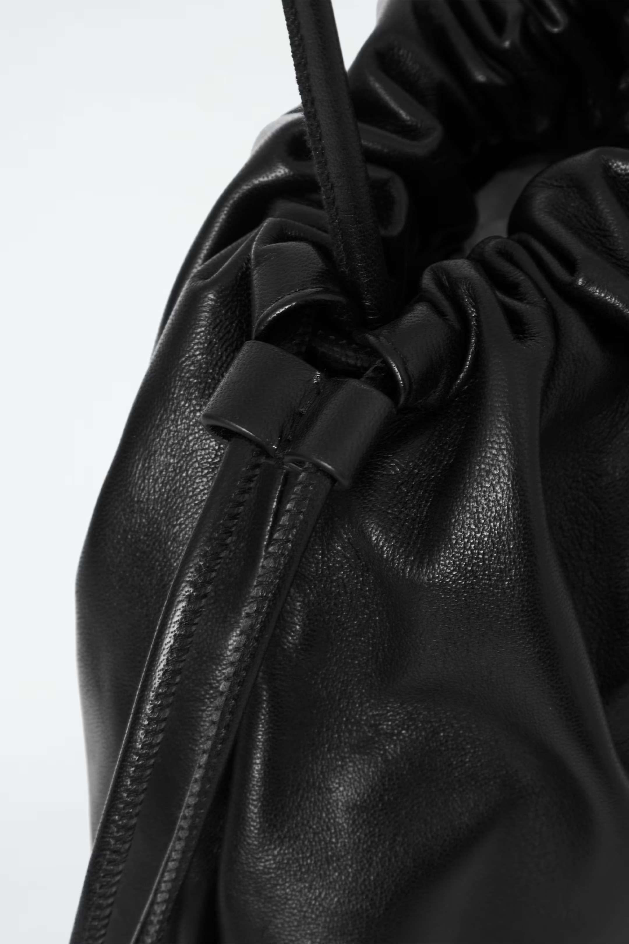 MINI CAVATELLI CLUTCH BAG - LEATHER - BLACK | COS GB | COS UK