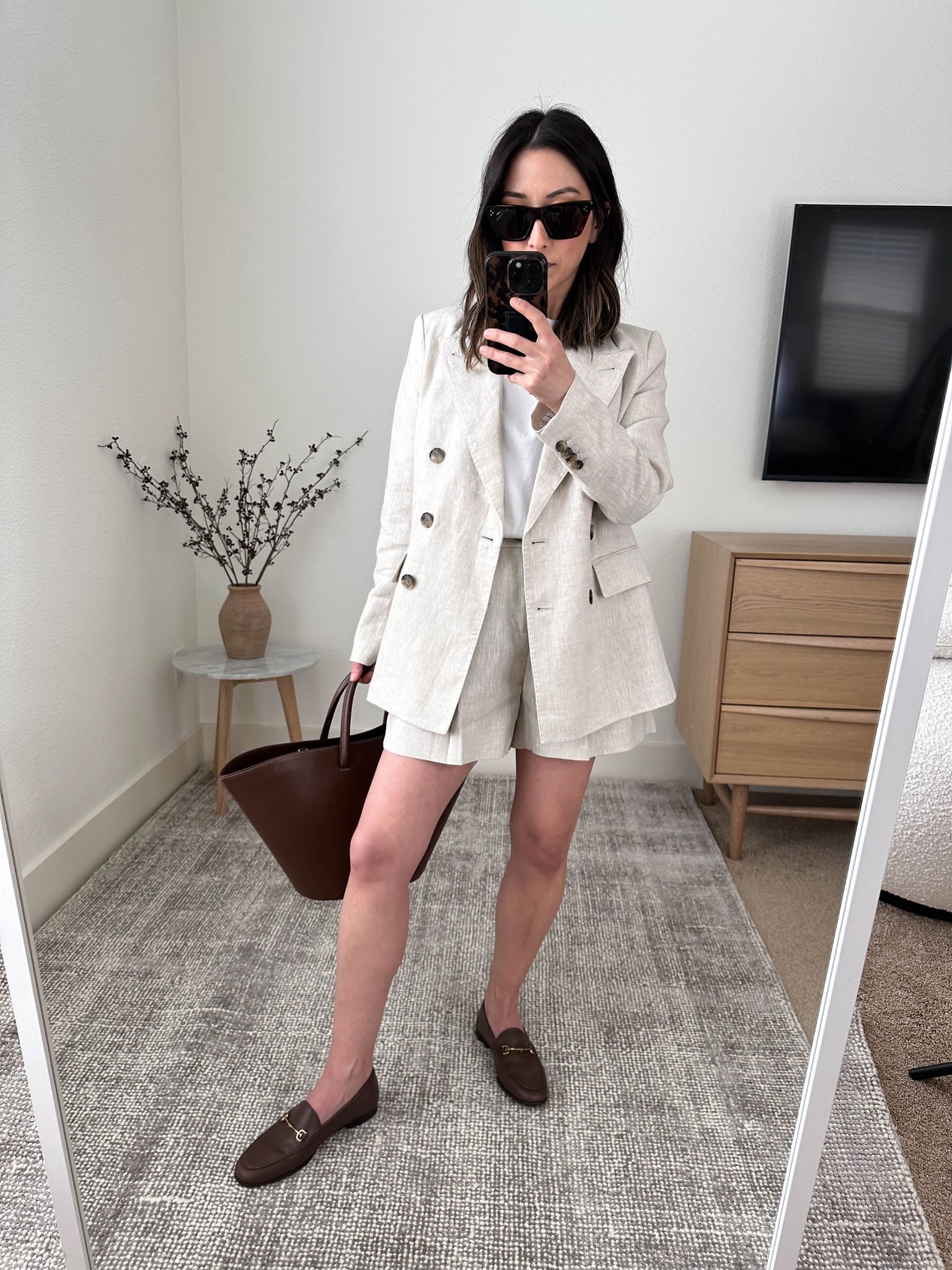 Spring outfits. Elevated spring outfit idea. 

I love a blazer short set and this one is stunning from Banana Republic. Unfortunately, it's old, but linking similar. I love a double breasted blazer and with brands like BR and J.Crew I just size up for a more modern fit. 

Banana Republic blazer petite 4 (old, linked similar)
Everlane tee medium
Banana Republic shorts petite 0 (old, linked similar)
Sam Edelman loafers 5
Liffner tote (old color)
Celine sunglasses 

Spring style, spring outfits 2026, petite style, work outfits, business casual 

#LTKSeasonal #LTKPetite #LTKootd