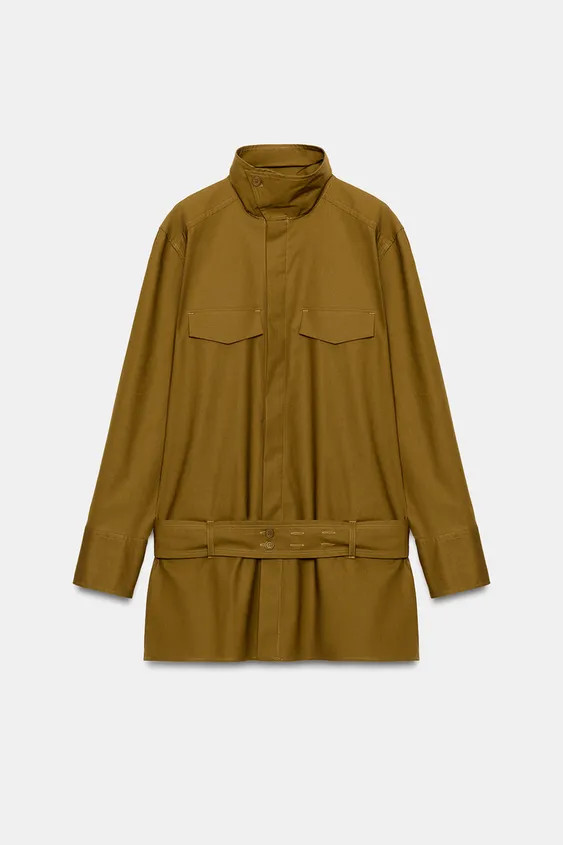 Model height: 176 cmMini dress featuring a high neck and long sleeves. Faux chest pockets with fl... | Zara UK