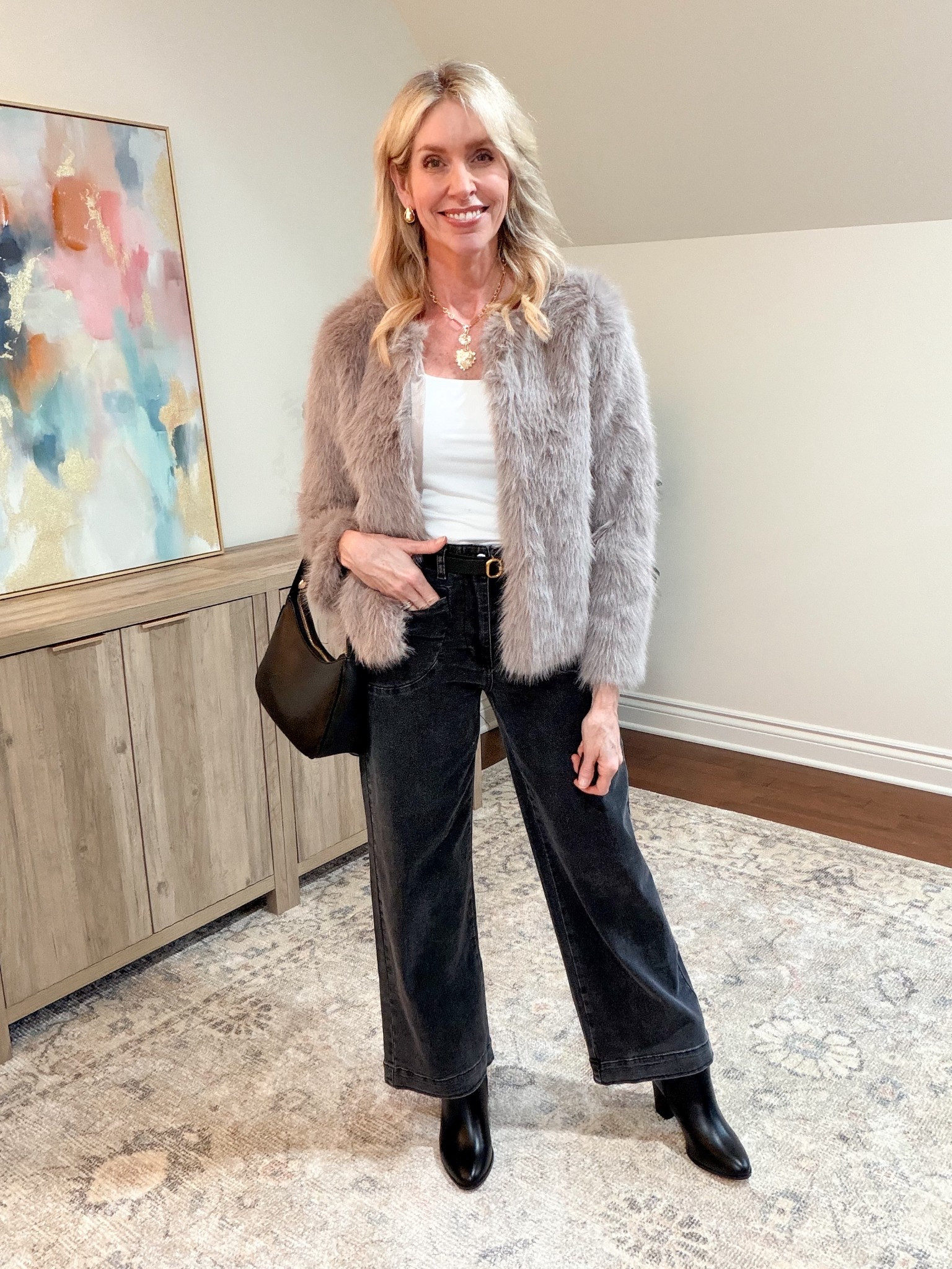 Faux fur coat that looks expensive but is under $40! Comes in 6 colors and fits true to size. 

#LTKOver40 #LTKFindsUnder50 #LTKootd