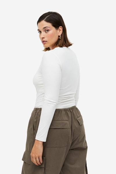Top de manga larga en punto - Negro - MUJER | H&M ES | H&M (FR, IT, ES, PT, BE)