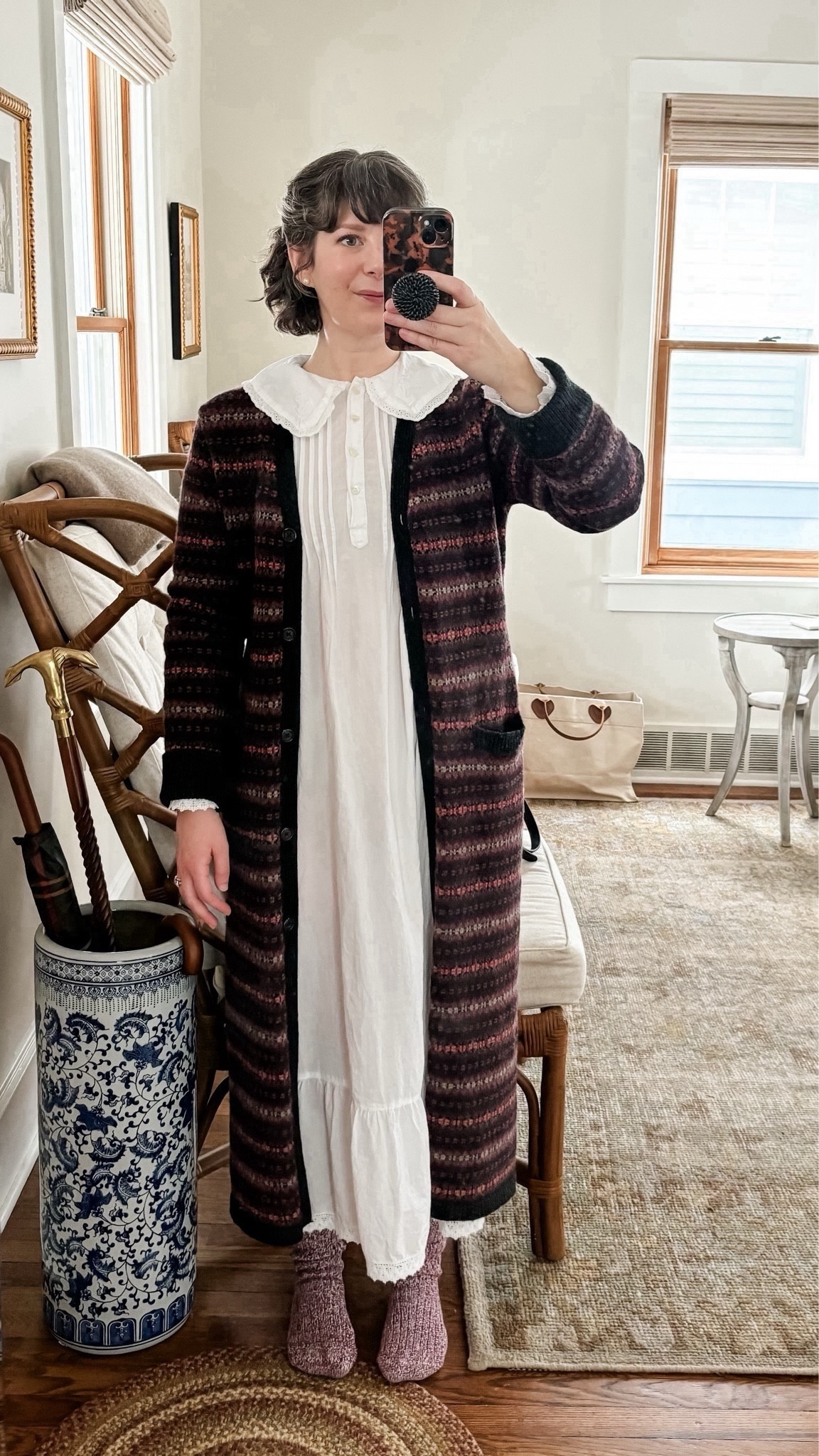 OOTD // January 31, 2024 - two ways to wear a duster cardigan: at home and going out. In the second photo, my hair is almost back to its curly bob preferred length. 🙌🏼 It’s still too short on the top layer (I prefer a blunt bob chin length or longer) but it’s soooo close 💃🏻

January has been a month lacking in sartorial inspiration for me. When I’m not skiing, I want to be home cozied up in pajamas or leggings with cozy sweaters. I found this vintage Ralph Lauren wool cardigan duster last year and wore it non-stop while we were in Northern California for January and February. I totally forgot about it until today. 🙃 BUT I found my exact vintage duster cardigan and linked it below!! 

#LTKstyletip #LTKover40 #LTKSeasonal