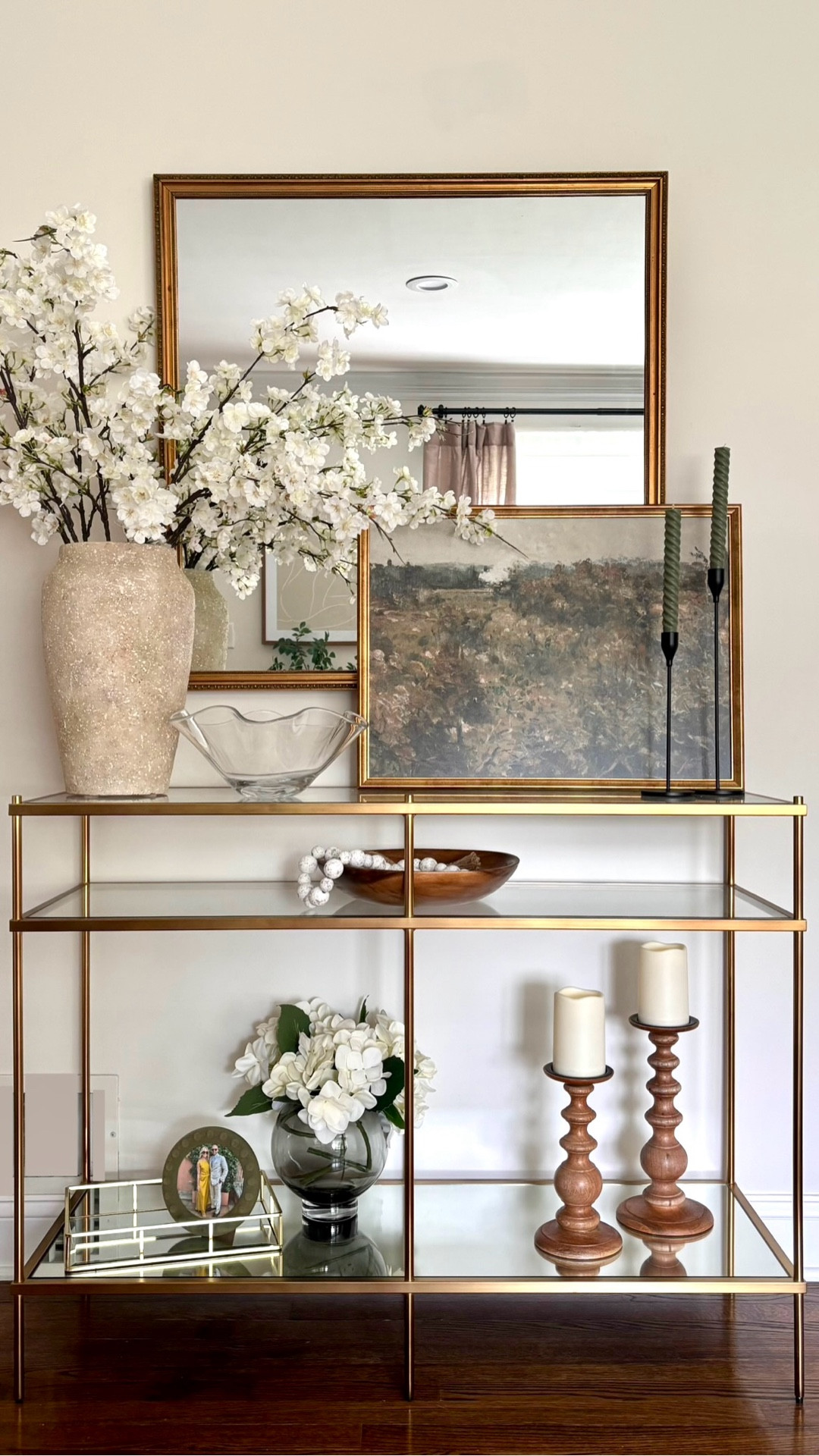 Console Styling 101:

✨ How to style your console like a pro interior designer

1) Repeat materials/colors throughout 
 (ie. ceramic, woven, wood…)

2) Arrange items in groups of three

3) To avoid it looking cluttered, use impactful LARGE items VS many smaller items

*BONUS*
Mixing in personal/meaningful decor makes for a great conversation starter !
 (ie. family photos, souvenirs from your travels…)


🫶🏻 DOUBLE TAP if you found these home decorating tips helpful!


.
.
Transitional Vintage Console Styling Inspiration 
#consolestyling #shelfstyling
#homedecoratingonabudget 
affordable home decor | designer inspired home | Transitional Style Decor | Shelf Styling Inspiration | Interior Decorating Tips | Neutral Shelf Styling Ideas | Organic-Modern Home Decor 

#LTKHome #LTKFindsUnder50 #LTKStyleTip