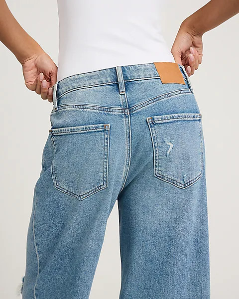 Low Rise Light Wash Ripped Baggy Jeans | Express