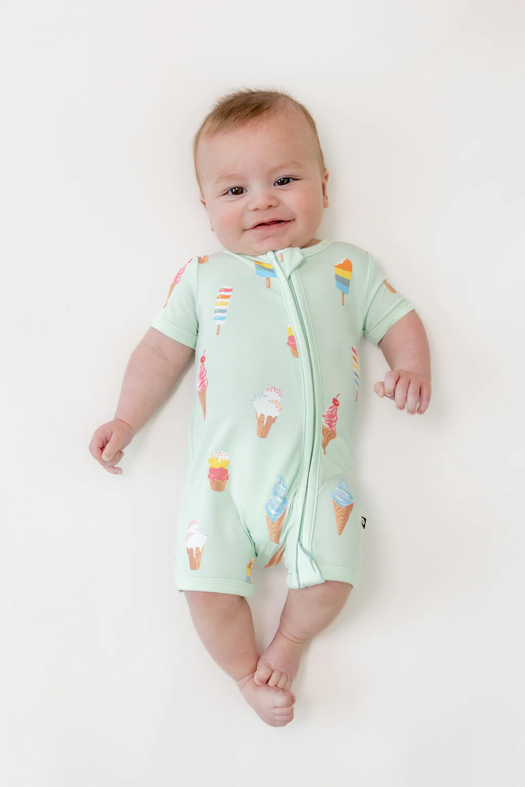 Zipper Shortall Romper in Mint Ice Cream | Kyte Baby
