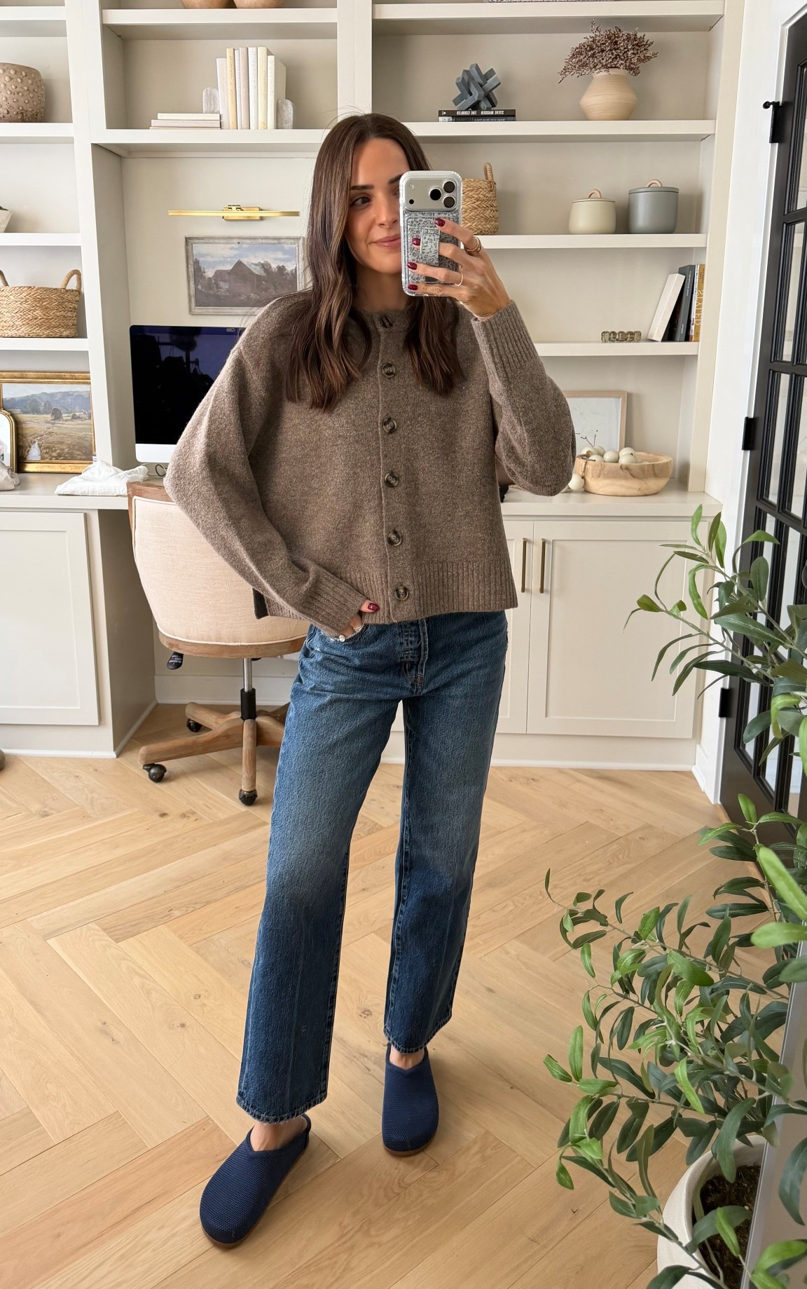 Outfit of the day!
Cardigan sweater on clearance 55% off 👀 wearing my true size S 
Straight leg jeans: tts 
Clogs: size down 1! 



#LTKootd #LTKSeasonal #LTKSaleAlert