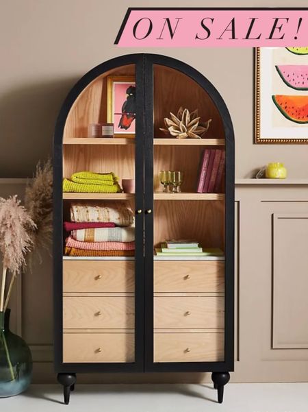 Favorite arched storage cabinet is now on sale! Many colors available. Living room decor, home decor, Anthropologie home.

#LTKSeasonal #LTKHome #LTKSaleAlert