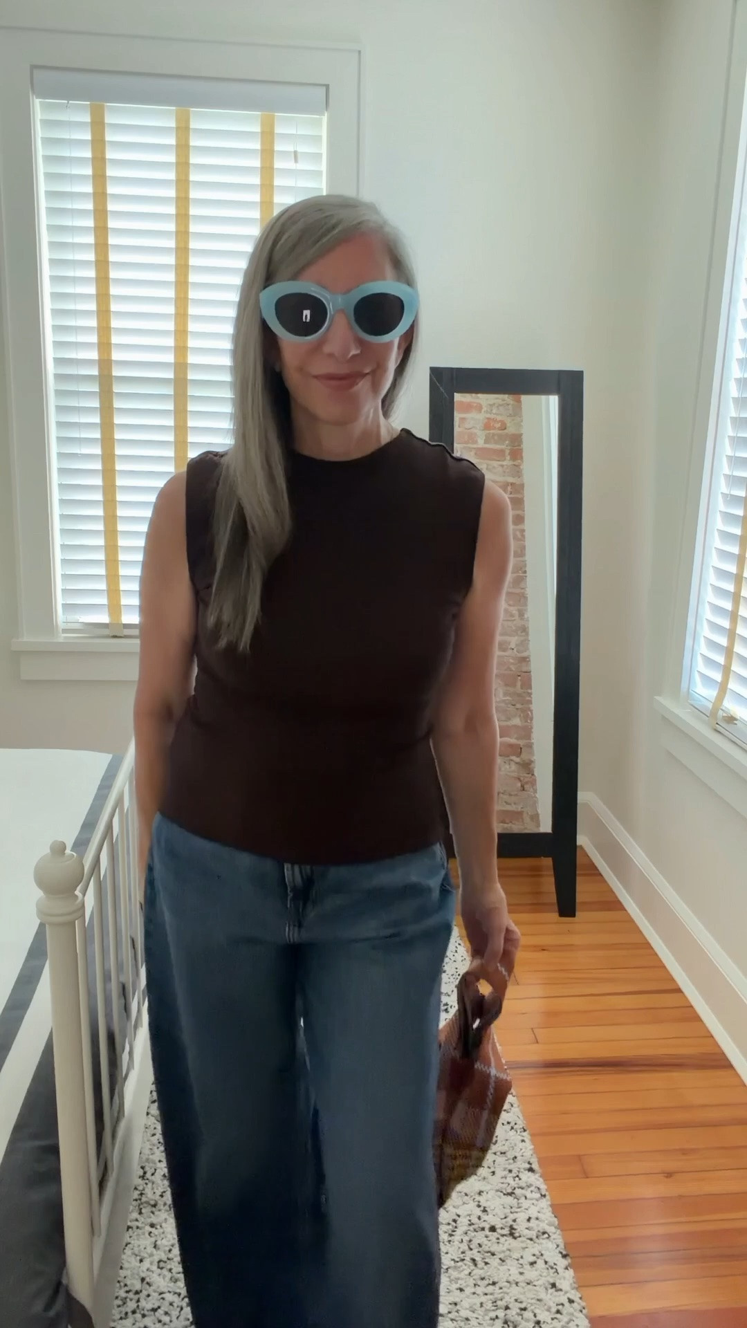 Brown and blue — the neutral pairing that never gets old.

This Zara tank is the ribbed tank upgrade I've been looking for — more structure, more polish, three colors in my closet now. Old Navy baggy wide-leg jeans. Paracord sandals — a very convincing dupe for the Miu Miu version at a fraction of the price. The bag is keepitcoolnyc — woman-owned, handcrafted, not on LTK but absolutely worth looking up. Everything that's linkable is linked here! @Zara

#LTKOver40 #LTKootd #LTKSeasonal