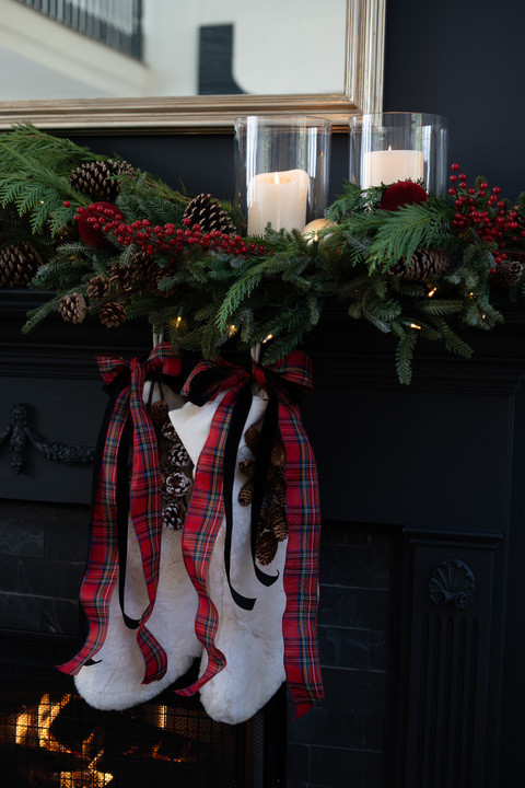 I am seriously freaking out over how magical this mantel turned out! The lush greenery, pinecones, and bright red berries look absolutely stunning against the dark fireplace, and those glowing candles make everything feel so warm and enchanting. And the stockings with the plaid bows?! I can’t handle the cuteness and coziness—this whole moment feels straight out of the most dreamy Christmas story! 

 #LTKHoliday #LTKSeasonal #LTKHome