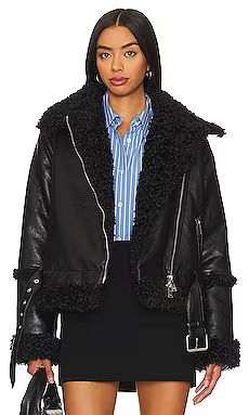 SIMKHAI Charleston Moto Jacket With Removable Sleeves in Black from Revolve.com | Revolve Clothing (Global)