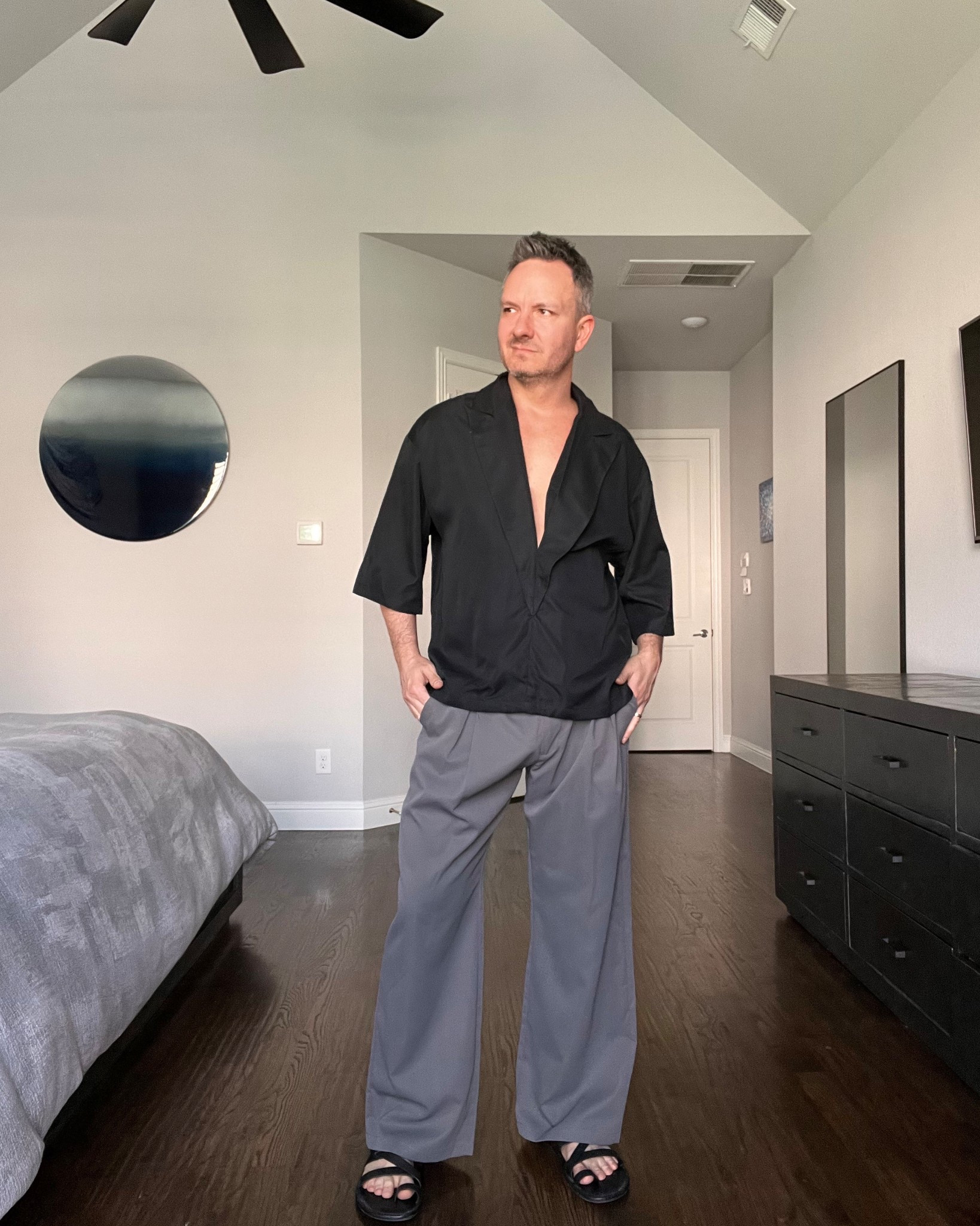 Relaxed black open-collar shirt paired with wide-leg trousers is that effortless elevated look everyone’s trying to get right. Lightweight, breathable, and slightly oversized so it moves. Perfect for summer dinners, rooftop drinks, or a resort night when you want to look put together without trying too hard.

#menssummerstyle #widelegpants #resortwear #mensfashion 

#LTKMens #LTKootd #LTKSeasonal