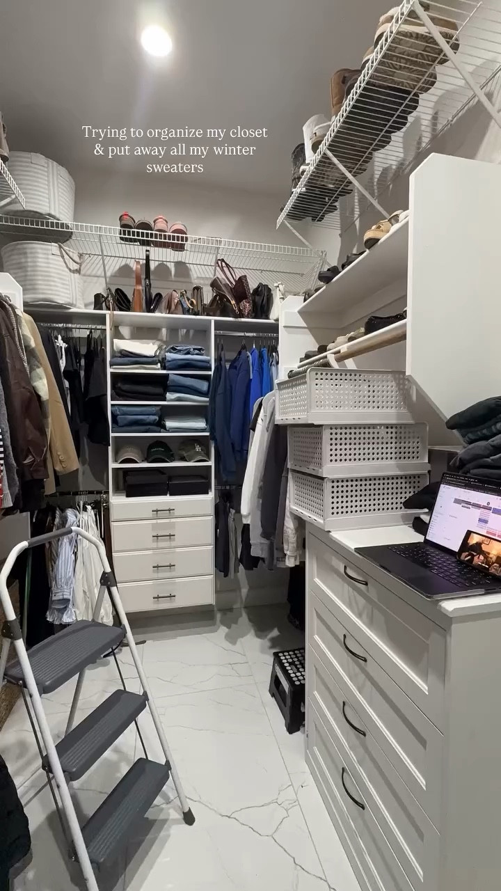 Trying to organize my closet & put away all my winter sweaters