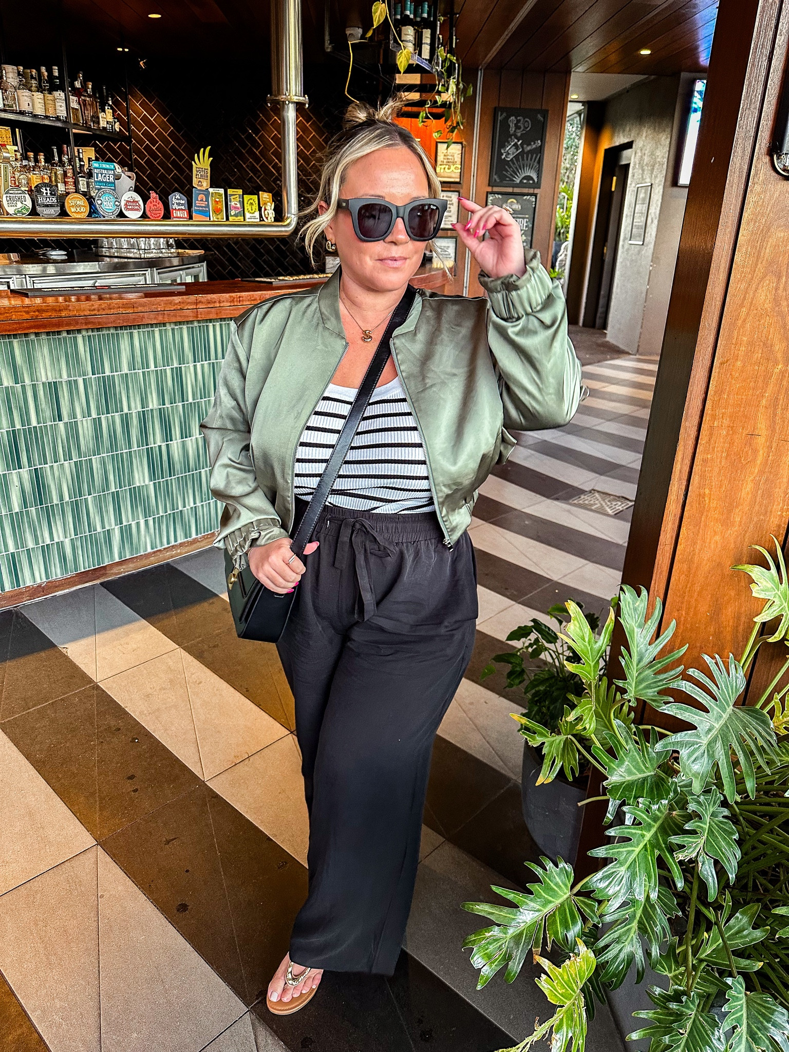 Australia outfit 
Midsize travel outfit 
Bomber jacket size large 
Tank top size XL 
Pants size large 
Use code STYLENRIGHT20 for 20% off site wide 

Travel outfit, midsize style, casual outfit, midsize mom, size 12 style, fall outfits 

#LTKTravel #LTKMidsize #LTKSeasonal