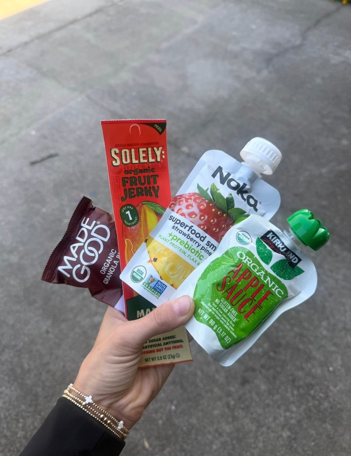 Perfect on the go snacks! Made Good granola bites, Kirkland organic apple sauce, SOLEY fruit jerky, and Noka smoothie pouch! 

#LTKStyleTip #LTKFamily #LTKKids