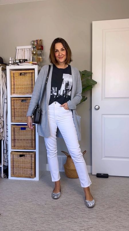 Spring outfit in black, white and grey! My cardi and jeans are both 50% off! I got this men’s graphic tee in XXL cause I wore it as a dress but it probably fits tts. My cardi is M (I have long arms) and I got the jeans in my usual size 27. Silver ballet flats fit tts and come in several colors. Also linked my bag plus similar that are more affordable.


#LTKitbag #LTKVideo #LTKshoecrush