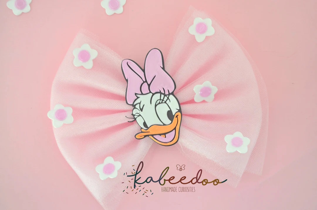 Daisy duck hair bow, Donald Duck girlfriend hair clip, Disney Daisy hair bow, girl duck hair bow ... | Etsy (US)