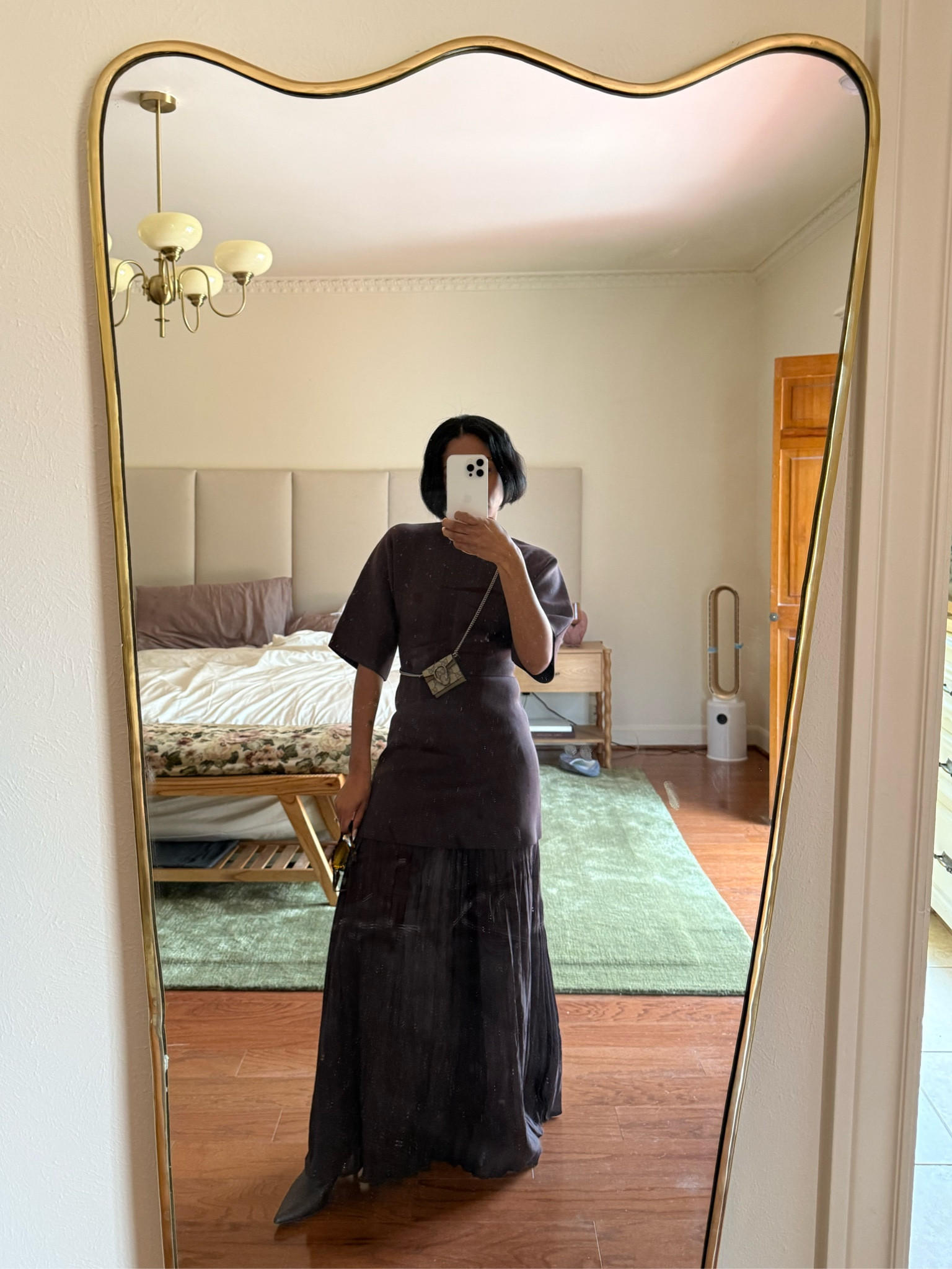 Brown pleated maxi dress and brown pointed toe boots

#LTKStyleTip