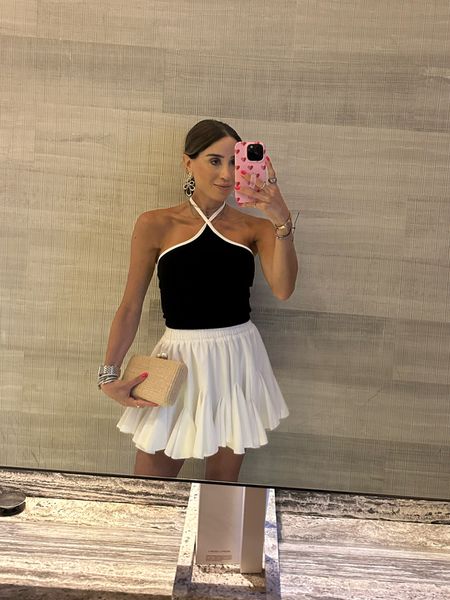 Black halter top size Xs white skirt smallest size 

#LTKFindsUnder50 #LTKFindsUnder100