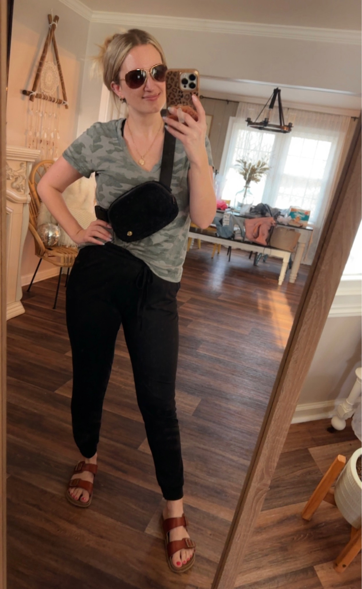 This is my “I need to go to the airport asap and fly in the clouds” outfit. 🤣 Linking up similar tees from Target. Same brand, fit and style just different colors. These are softest and comfiest tees! I’m wearing a size medium. They are loose through the body and have a slight fit to them especially in the sleeve. Very feminine comfy tee in my opinion! Also I love these sandals! They are my go to. Exact pair from #target is linked up. #springstyle #comfyootd 

#LTKstyletip #LTKtravel #LTKSeasonal