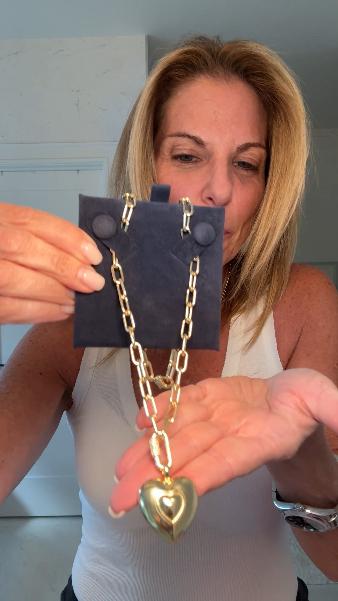 The MB Styles puffy heart on paper clip chain makes a bold statement. Obsessed! Also comes in 2 lengths and in silver. 

#LTKOver40 #LTKStyleTip