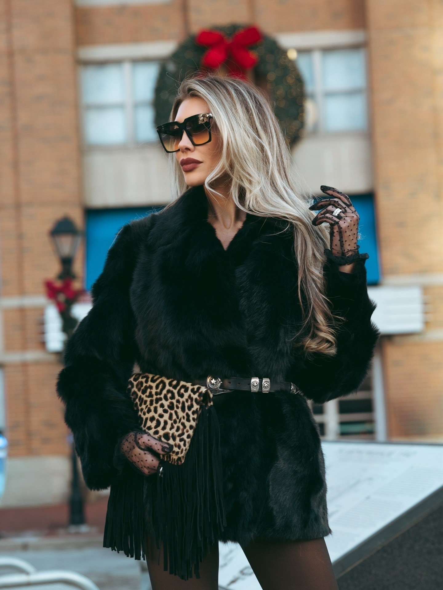 Thank you 2025 🙏 2026 I love you. Happy New Year!! Ringing in the year with lots of luxe textures. My shearling coat is Theory, I sourced some similar styles. My leopard print fringe bag is by ThePerfext,  I found the exact bag available on eBay for you! My opaque black tights are Wolford, patent black stilettos are Christian Louboutin, and sunglasses are Tom Ford. My sheer polka dot gloves by Sierra Darien are a fun glamorous touch. Happy New Year! ✨

#LTKGiftGuide #LTKFindsUnder50 #LTKSeasonal