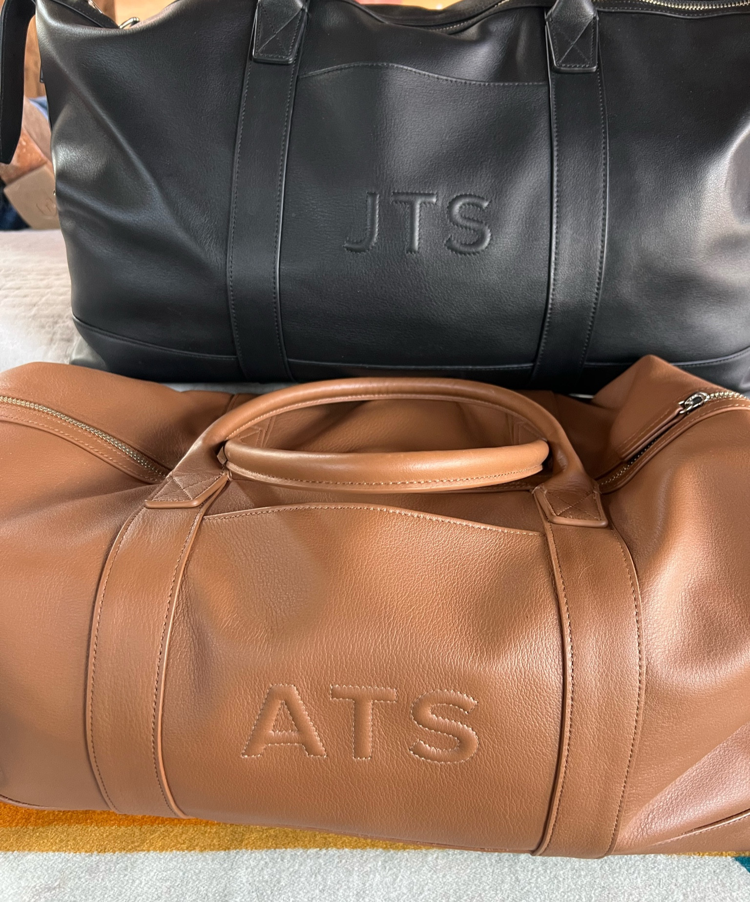 His and hers leatherology totes. Perfect for a weekend getaway!