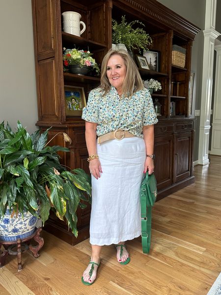 White linen Abercrombie skirt. Did you notice the scalloped hem!? Wearing size 12 short 

Blouse sizeXL. It’s a pretty floral eyelet. 15% off code NANETTE15

Liming a few similar Kelly green bags. It’s such a fun pop of color. Kate spade is 30% off! 
Sandals on sale too! 

Abercrombie linen summer blouse summer outfit 

#LTKOver40 #LTKMidsize #LTKFindsUnder100