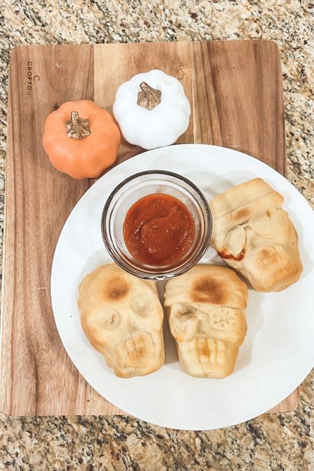 Found this awesome pan and used it to make mini skeleton pizzas using a crescent roll sheet - check out my Instagram page for the entire recipe.  These would be great to serve as an appetizer at your Halloween party / gathering, fun for football watching between now and Halloween or even for a fun festive dinner.

I am going to try a breakfast version with some cream cheese and homemade apple pie filling!

Halloween
Decor
Baking
Cooking
Skeleton Pan
Halloween Food
Amazon
Silicon Mold
Fall

#LTKHalloween #LTKSeasonal #LTKhome