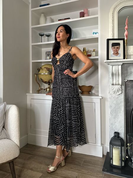 Monochrome polka dot ruched dress perfect for all the incoming spring dates or with a blazer 

#LTKstyletip #LTKeurope #LTKMostLoved