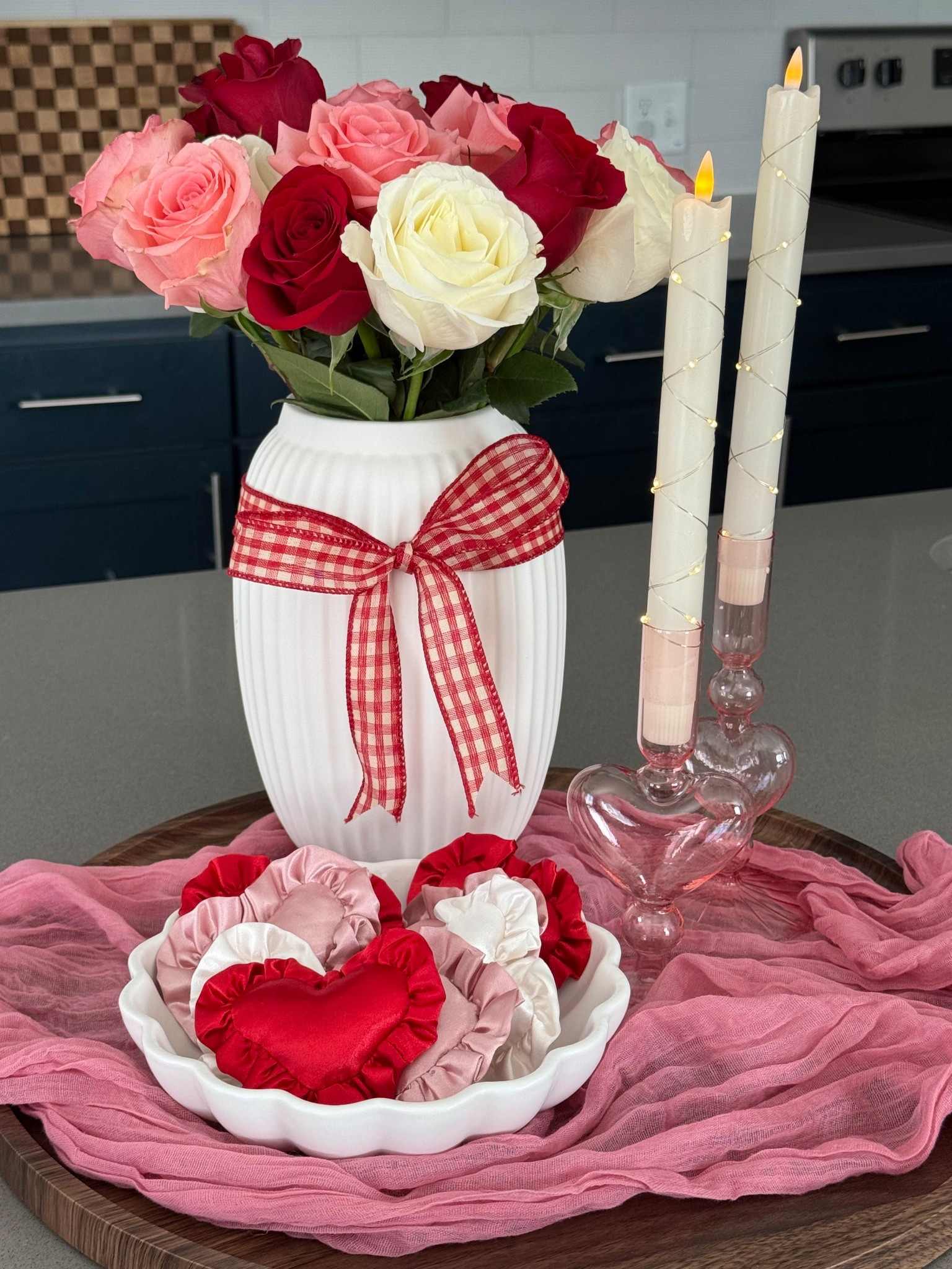 An easy Valentine’s centerpiece idea. Love these candles led sparkly candles to keep out all year through the changing of the seasons. 💕❤️✨

#LTKValentine #LTKHome #LTKSeasonal