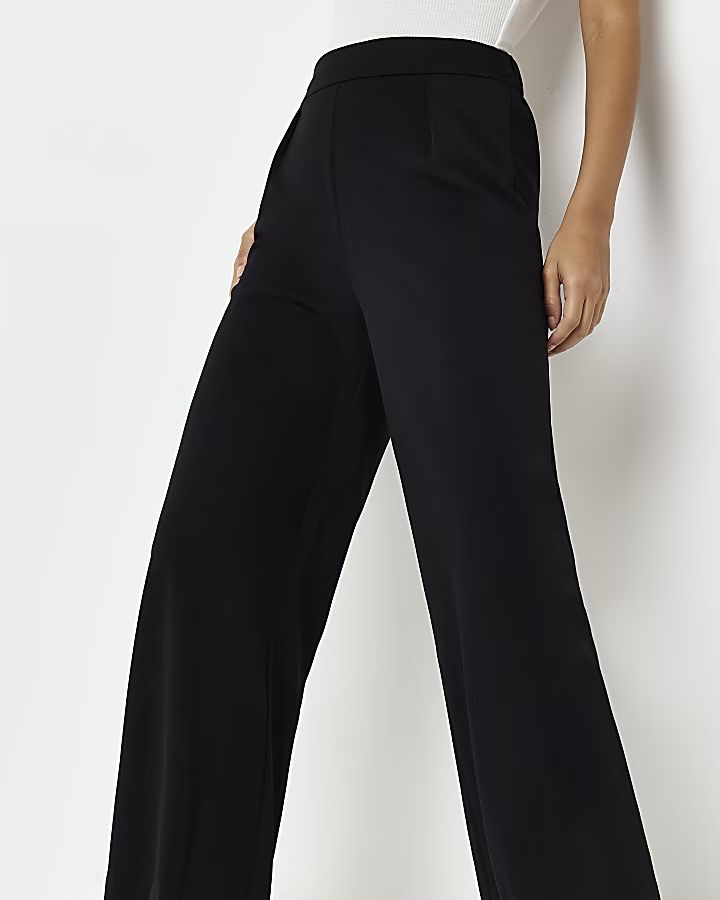 Black high waist wide leg trousers | River Island (UK & IE)