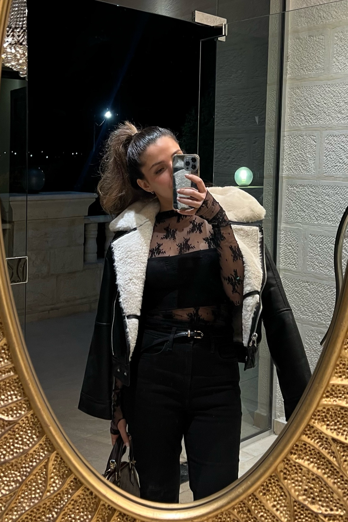 Mesh free people top and black leather and sherpa biker jackett

#LTKsalealert #LTKfindsunder100 #LTKstyletip