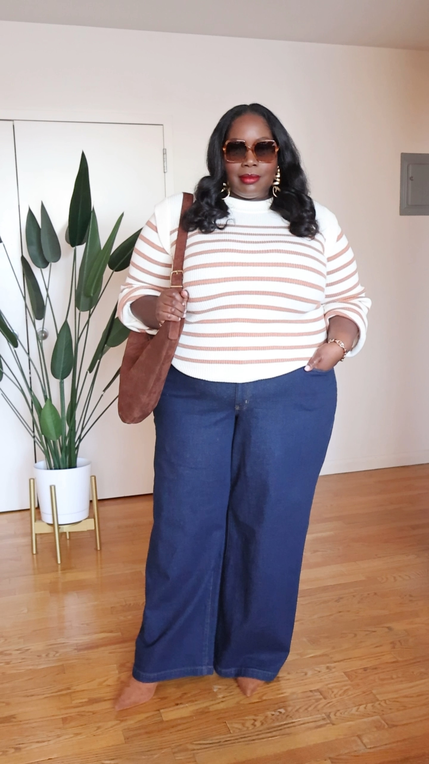 Created a plus size fall outfit around this suede hobo bag. I paired wide leg jeans with a striped sweater, suede boots, and this suede oversized hobo bag. 

I’m obsessed with it. It’s the perfect winter handbag. 

#LTKMidsize #LTKOver40 #LTKPlusSize