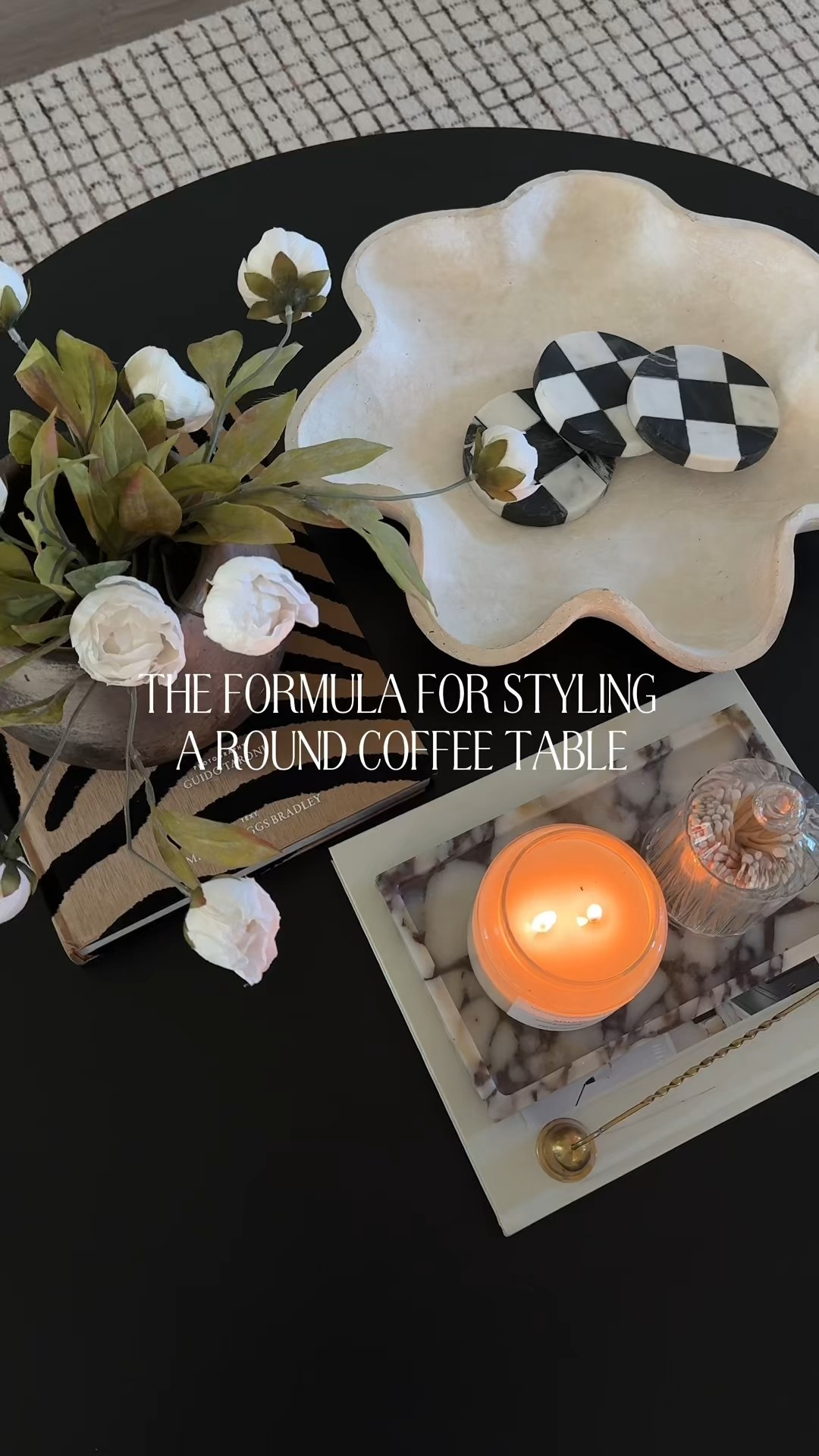 Round table styling. Round coffee table decor. Coffee table styling. Living room decor. 

#LTKstorytime #LTKSeasonal #LTKHome