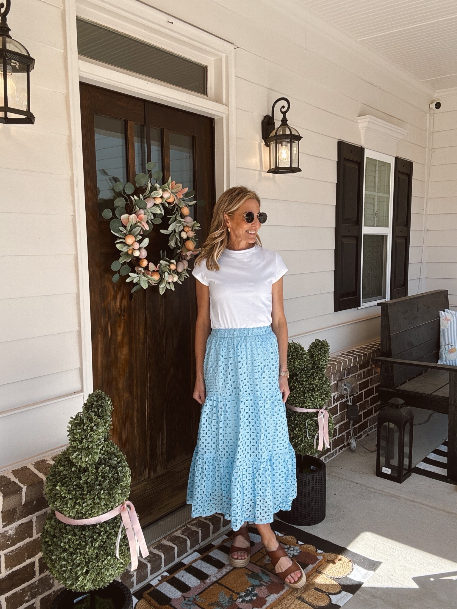A summer classic… This Amazon maxi skirt with Boho tiered eyelet details, perfect in spring and summer comes in over nine different colors wearing a size small. Walmart white tee. Under $10 