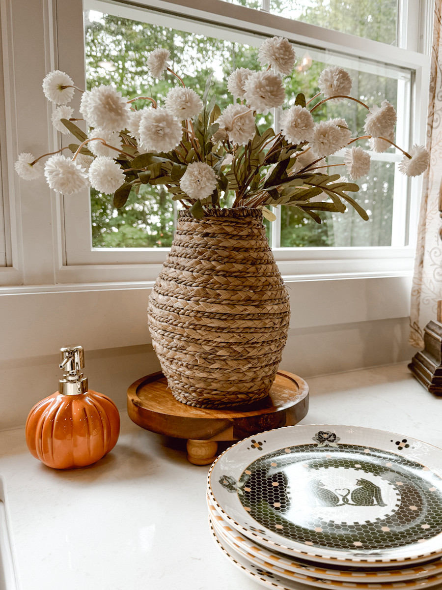 Here is an easy seasonal look for your kitchen. I added these neutral Fall mums, a pumpkin soap dispenser, and these dreamy stoneware plates.  

 #LTKSeasonal #LTKHome