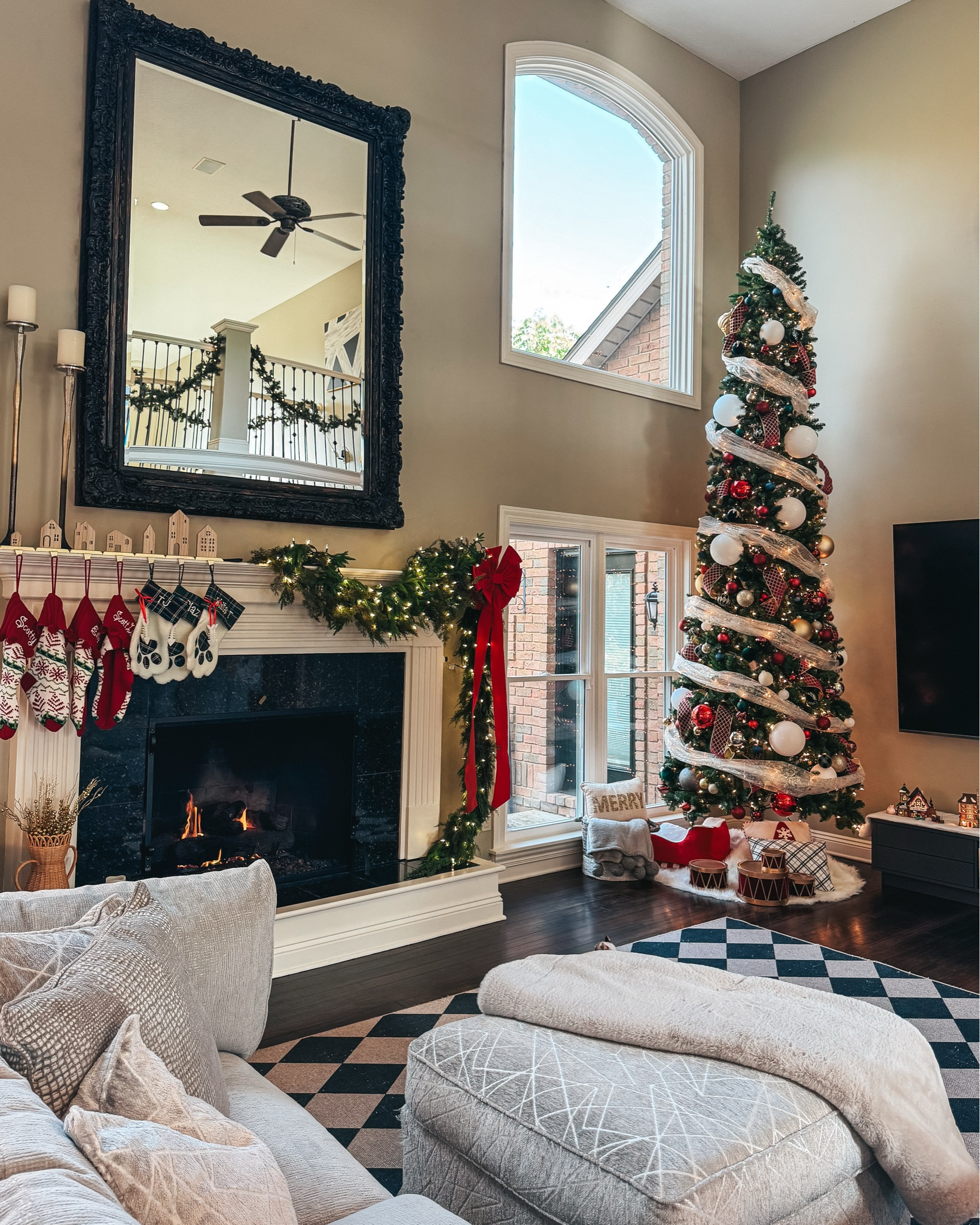 Christmas living room decor 2025. Christmas decor. Christmas tree. Ribbon decor. Vintage Christmas decor. Norfolk pine garland. Draping garland. Christmas mantle. 

#LTKHoliday #LTKHome