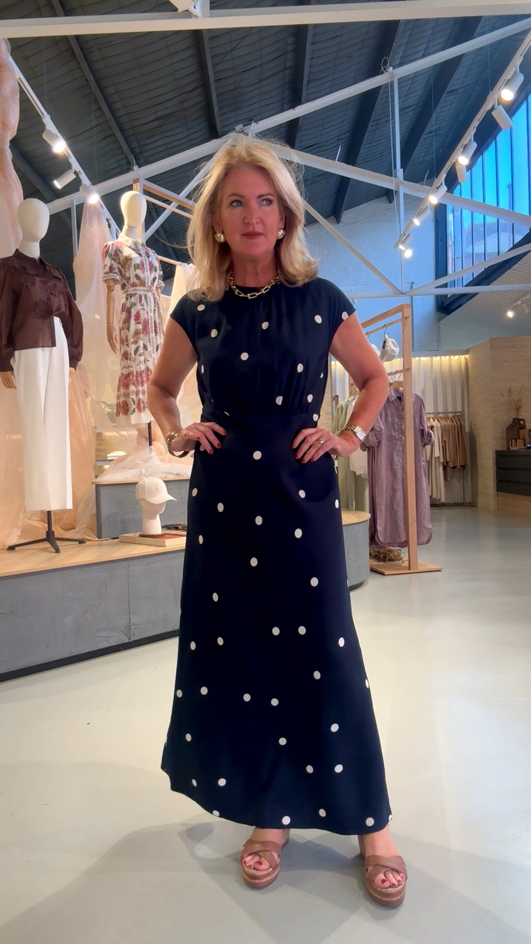 This dress is such a perfect style to dress up
or down. I love the flattering drape. I am wearing a size 10. 