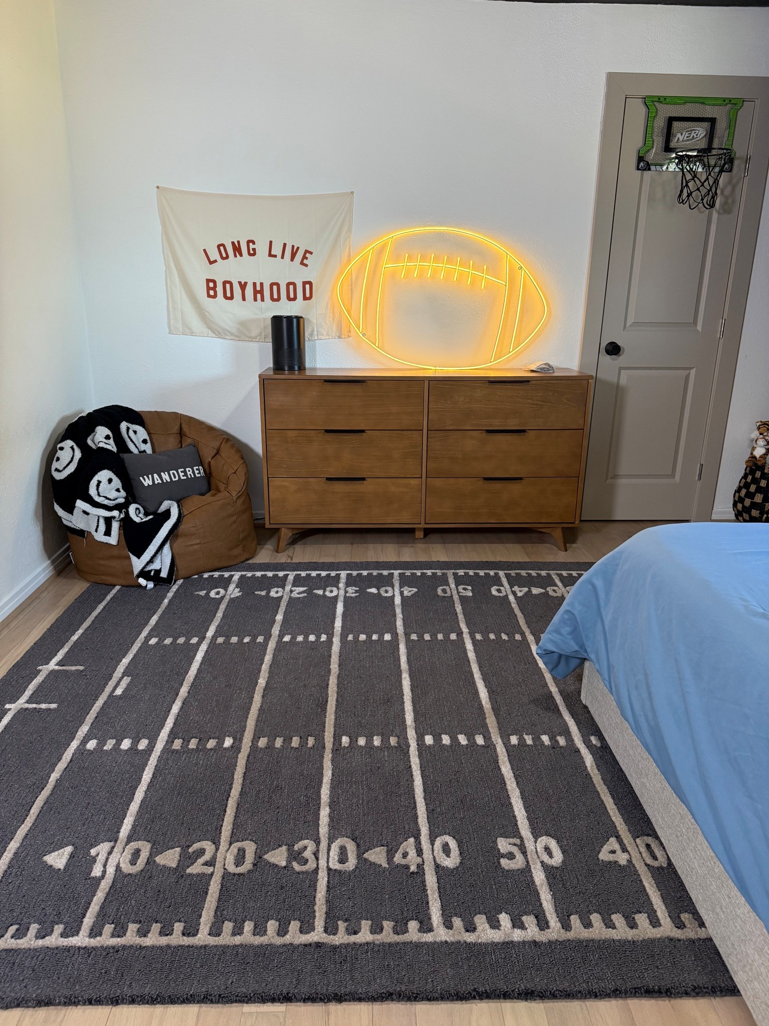 This rug is PERFECT! Pulls together the grays and browns in his rooms perfectly! Thick and cozy 🏈  

#LTKHome #LTKKids