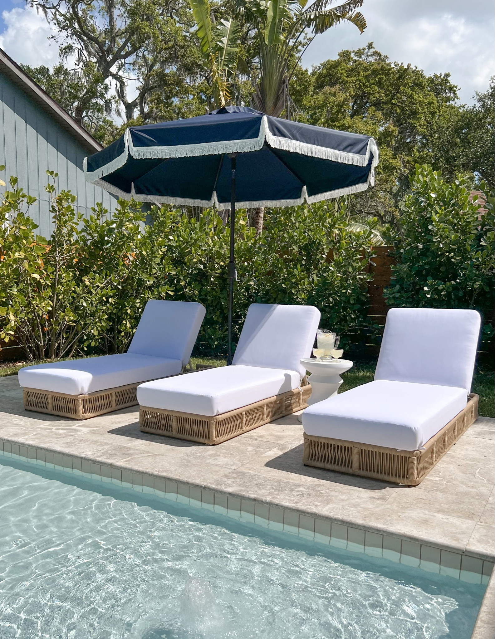 Safavieh patio! 
Gillian loungers, Milan Fringe Umbrella, Katara concrete accent stool. Patio furniture, patio chaise, fringe umbrella. 

#LTKhome #LTKFind #LTKSeasonal