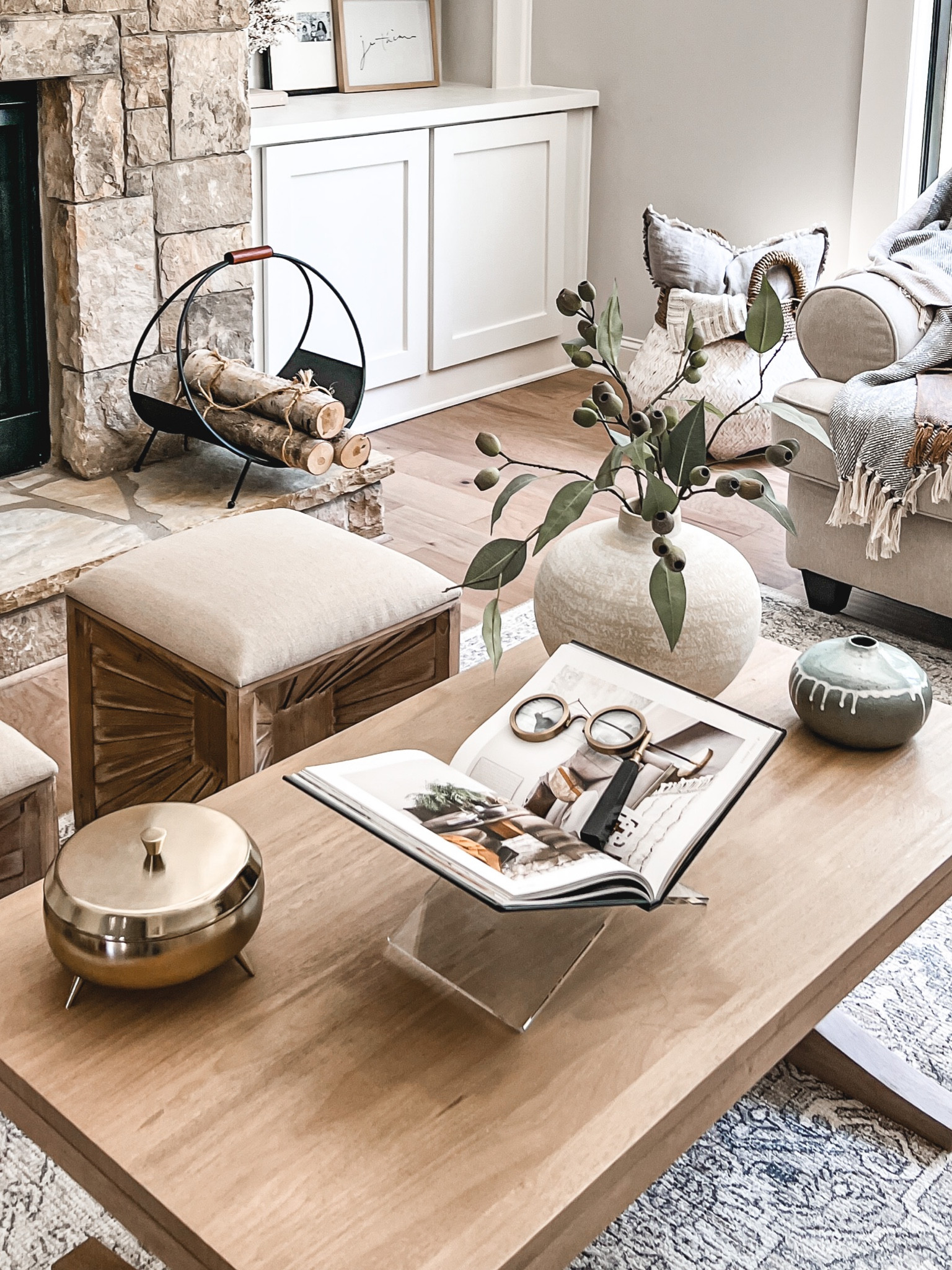 Styled the coffee table for the millionth time! I’m really loving the look with this pretty acrylic book holder! I think this look will hang around for a while! 

#vase #neutral decor # acrylicbookholder #fauxstem

#LTKhome #LTKFind #LTKstyletip