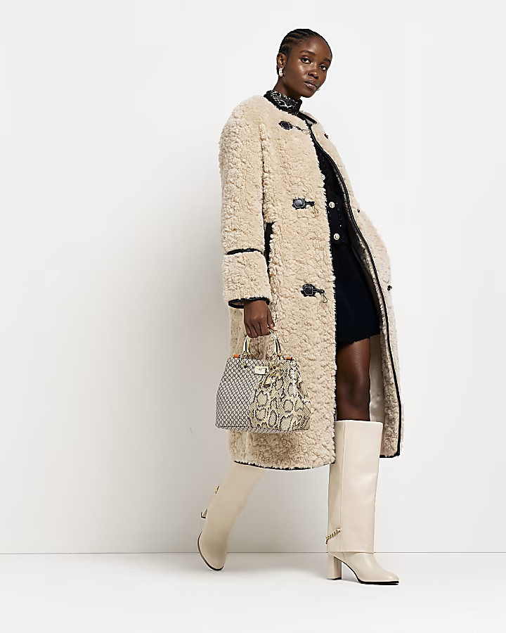 Beige faux fur longline coat | River Island (US)