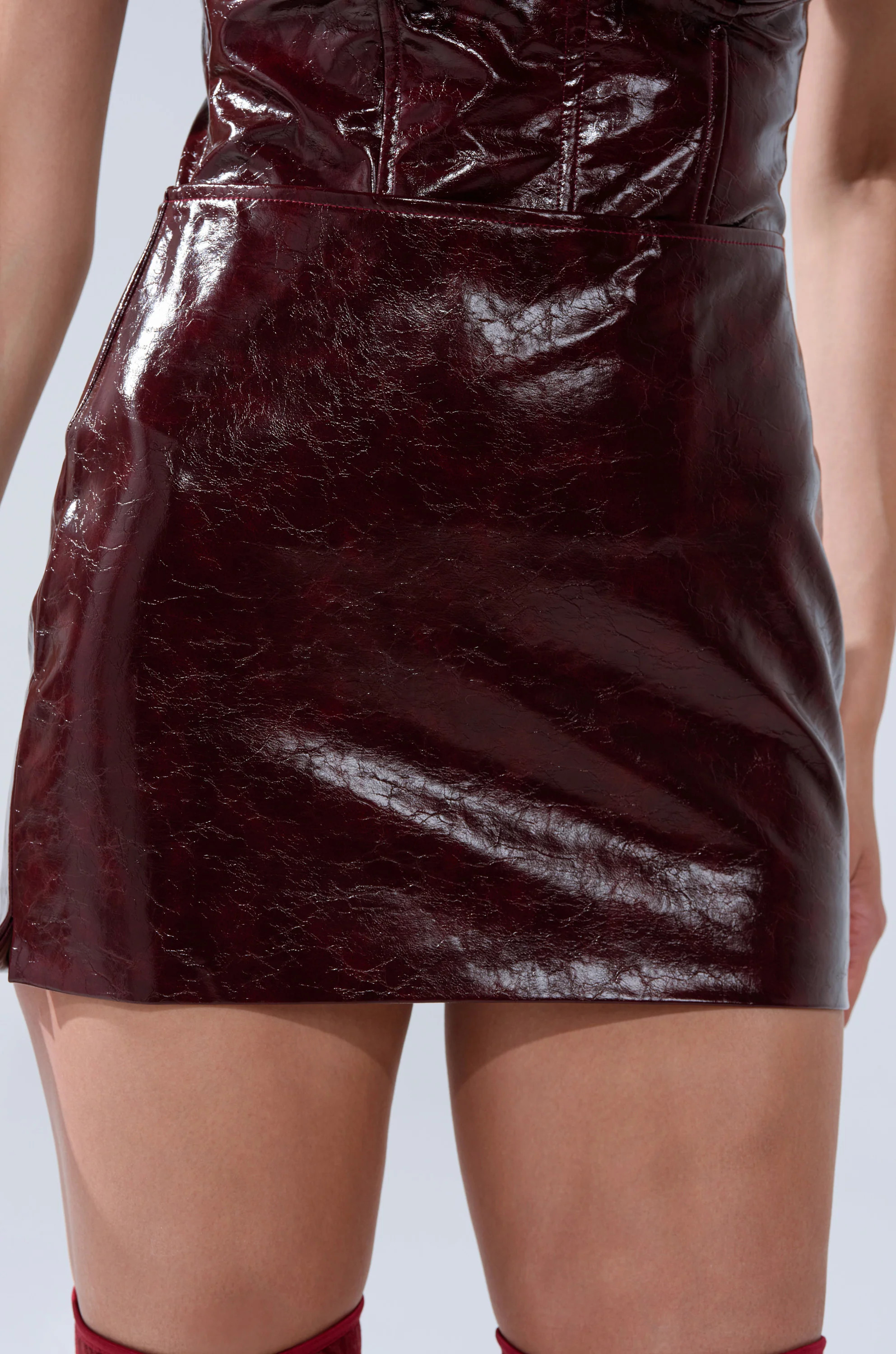 IM YOUR WEAKNESS FAUX LEATHER MINI SKIRT | AKIRA