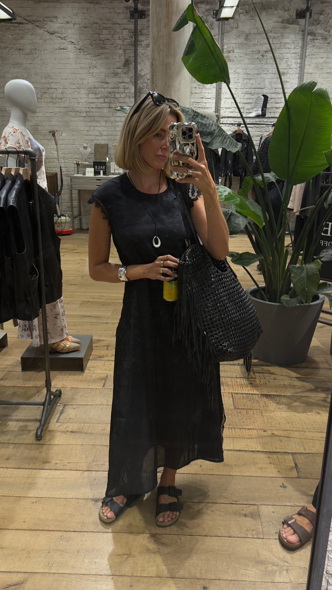 Black linen dress 
Black leather woven bag 
Black sandals 
Silver pendant necklace 
Summer outfit 

#LTKsummer #LTKeurope #LTKuk
