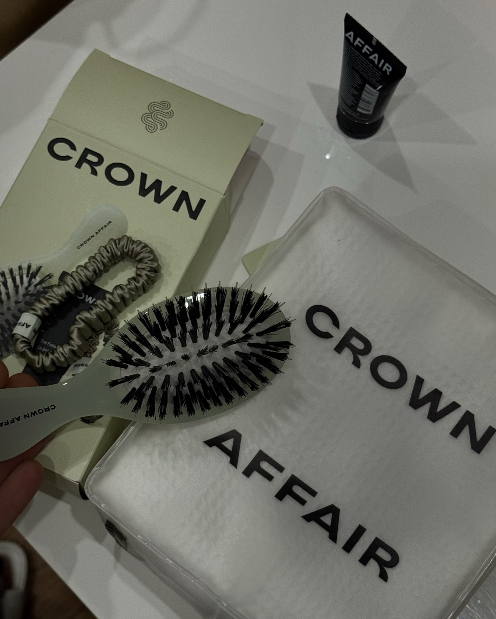 Obsessed with this hair brand 
every single product is a hit. You seriously can’t go wrong!

 I got their travel-size pack because I was looking for a small brush, and it came with a mini finishing gel and a silk scrunchie. So perfect!

& the best hair towel 

What it is: A waffle-knit hair towel made from a custom blend of microfibers to quickly absorb water, speeding up your air-dry and preventing frizz and breakage.

Hair Texture: Straight, Wavy, Curly, and Coily

Hair Type: Fine, Medium, and Thick

Hair Concerns:
- Damage, Split Ends, and Breakage
- Dryness
- Frizz

Key Benefits: 
- Reduces hair-drying time
- Prevents breakage and smooths frizz
- Improves long-term hair health

What Else You Need to Know: This towel’s custom waffle fabric gently absorbs moisture from your hair, drying it in a fraction of the time compared to a standard terry towel while protecting your strands from stretching, breakage, and other damage. Its unique shape and secure strap are designed for all hair types and lengths.