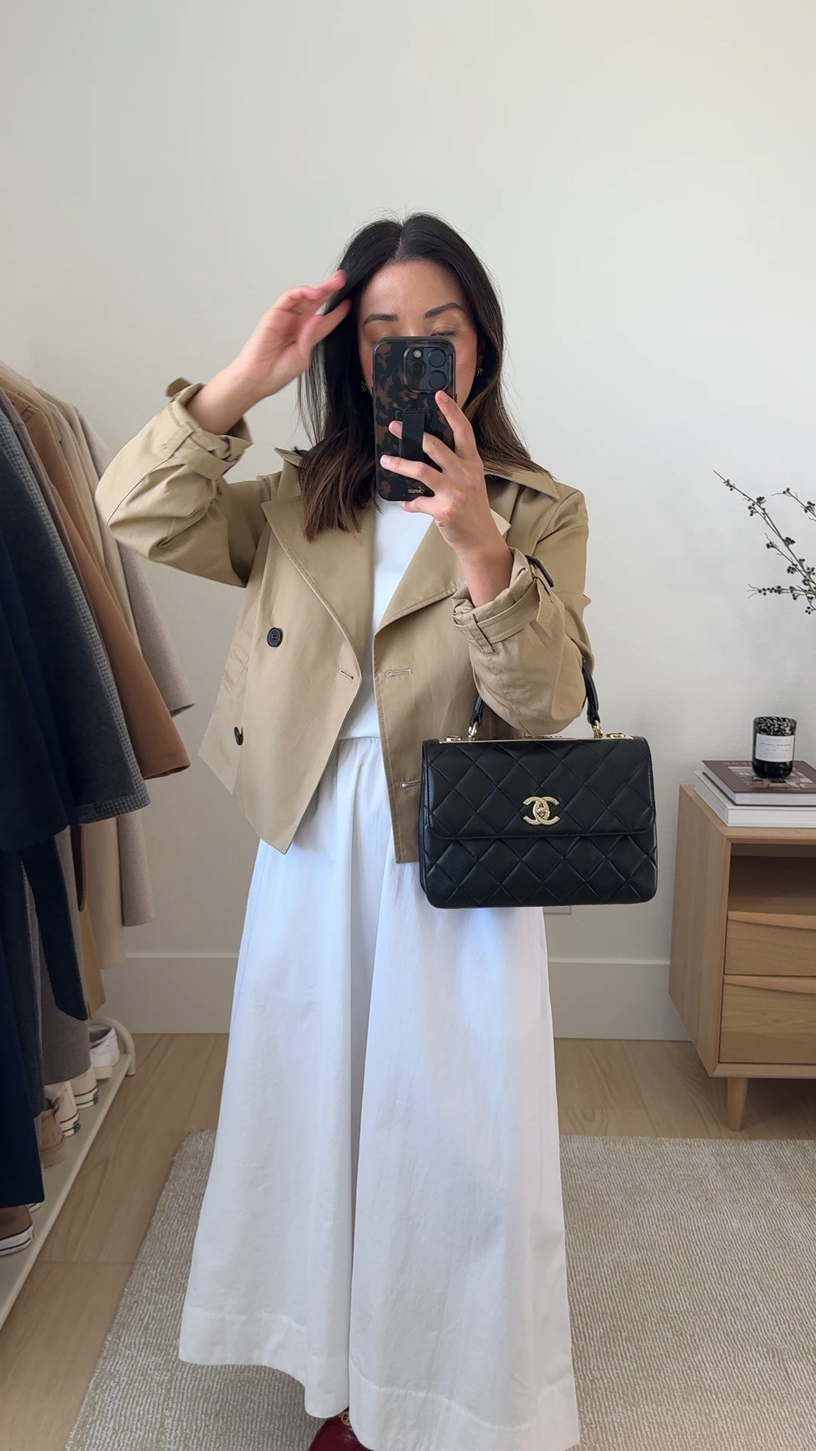 Transitional summer to fall outfit ideas. How to do transitional style. Cropped trench coats are a great way to add a little fall to your summer outfits. It's the perfect layer. This one is Aritzia and it runs TTS. I'm in a small but could easily wear the xs. Also wearing a dress with a tee over it.

Aritzia cropped trench small. Could wear the xs
Aritzia tee medium
Aritzia dress small
Chanel Trendy cc small
Sam Edelman loafers 5
YSL Sunglasses
Dorsey James necklace 15"
J.Crew earrings

#LTKItBag #LTKStyleTip #LTKPetite