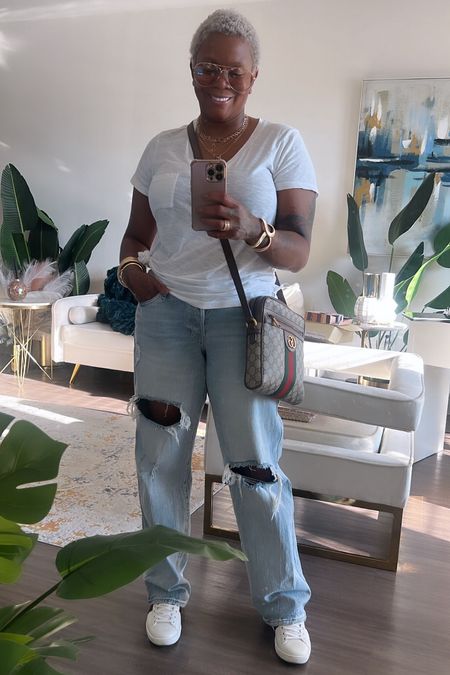 Cute outing outfit. White tee shirt, mom baggy jeans size 8. Gucci messenger bag & Gucci sneakers. And accessories 

#LTKsalealert #LTKover40 #LTKstyletip